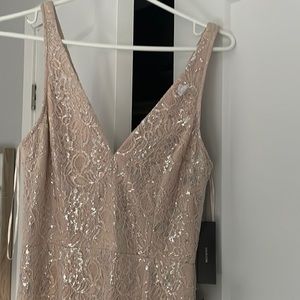 Brand new Lulus formal dress. Tags on. Light peach/pink with silver shinmer